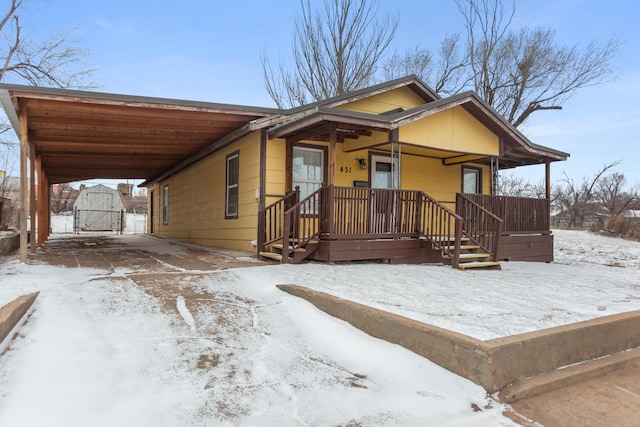 431 Crest, Pampa, TX 79065 - view of front of home with a carport, a gate, and driveway