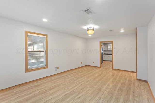 431 Crest, Pampa, TX 79065 - spare room with light wood-style floors, baseboards, and recessed lighting