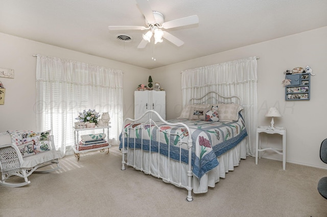 227 Ranger St, Hereford, TX 79045 - bedroom with carpet and ceiling fan