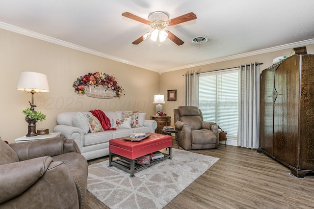 227 Ranger St, Hereford, TX 79045 - living room with ceiling fan, wood finished floors, and crown molding