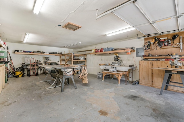 227 Ranger St, Hereford, TX 79045 - garage featuring a workshop area and electric panel