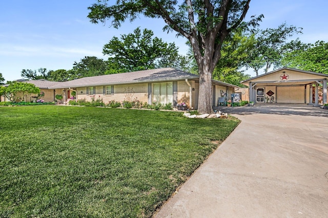 227 Ranger St, Hereford, TX 79045 - single story home with concrete driveway, a front lawn, and brick siding