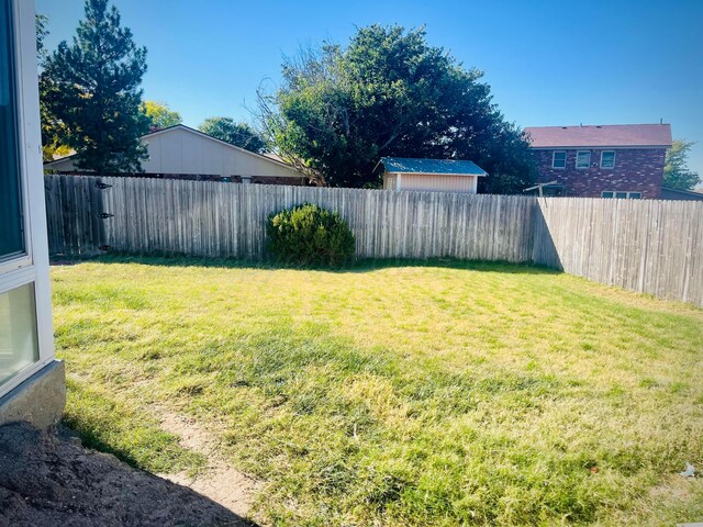 145 Pioneer Dr, Booker, TX 79005 - view of yard featuring a fenced backyard
