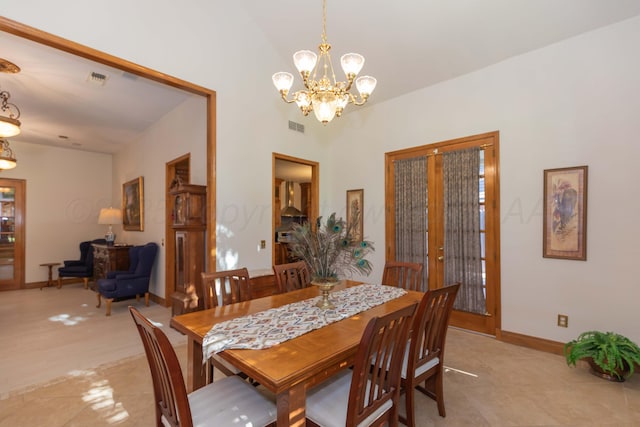 3616 Van Tassel St, Amarillo, TX 79121 - dining area featuring a chandelier, light tile patterned floors, and baseboards