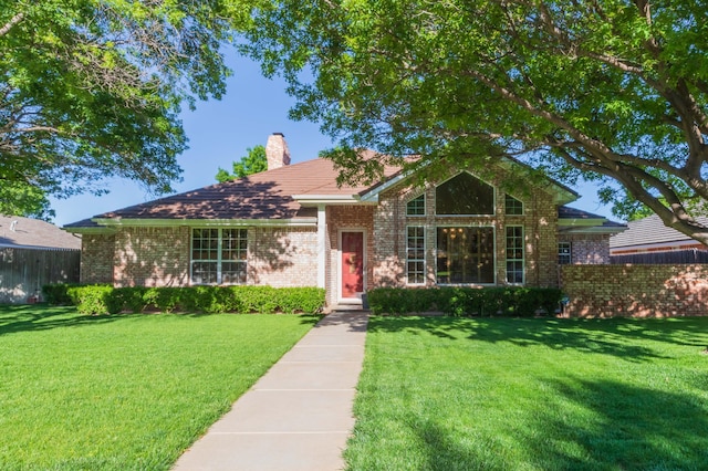 3616 Van Tassel St, Amarillo, TX 79121 - view of front of house with brick siding and a chimney