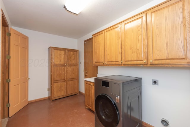 3616 Van Tassel St, Amarillo, TX 79121 - laundry room featuring washer / clothes dryer, cabinet space, and baseboards