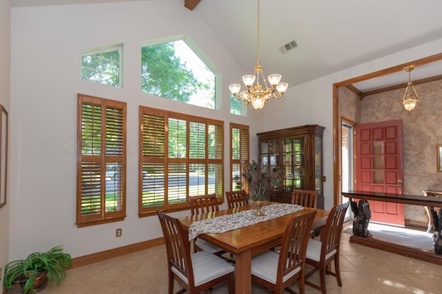 3616 Van Tassel St, Amarillo, TX 79121 - dining area featuring a chandelier, high vaulted ceiling, baseboards, and tile patterned flooring