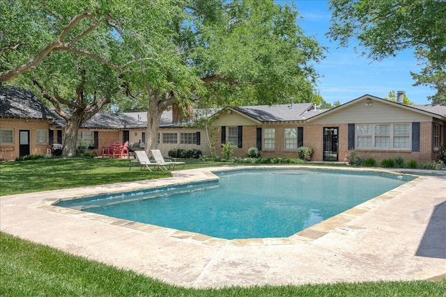 100 S Avondale St, Amarillo, TX 79106 - swimming pool featuring a lawn and a patio