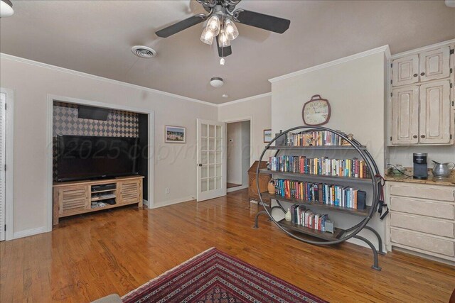 100 S Avondale St, Amarillo, TX 79106 - sitting room featuring ceiling fan, ornamental molding, and wood finished floors