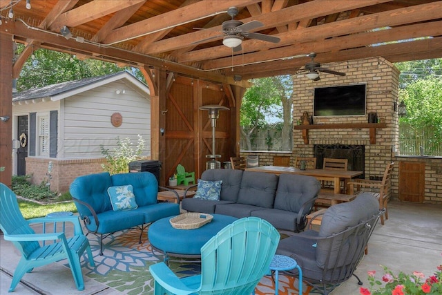 100 S Avondale St, Amarillo, TX 79106 - view of patio with an outdoor living space with a fireplace and a ceiling fan