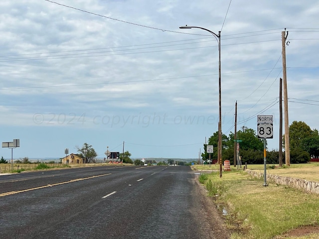 1814 N Main St, Shamrock, TX 79079 - view of asphalt street featuring traffic signs