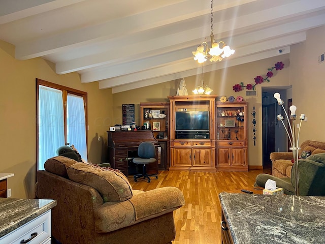 living room featuring light hardwood / wood-style floors, an inviting chandelier, and lofted ceiling with beams