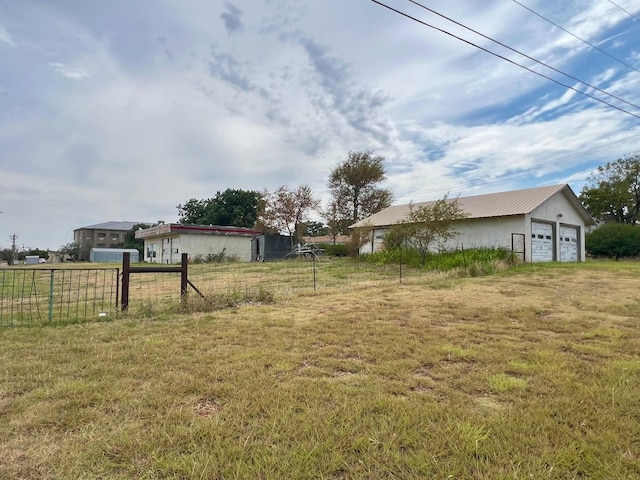 view of yard with a garage