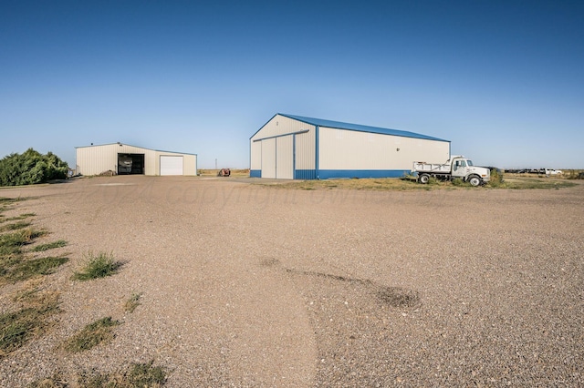 view of outdoor structure with a garage
