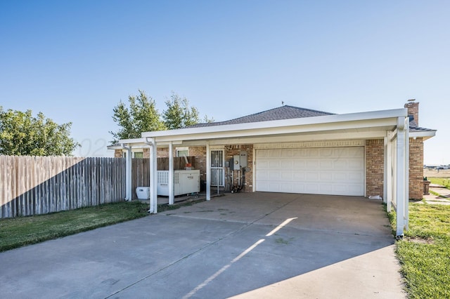 ranch-style house featuring a garage
