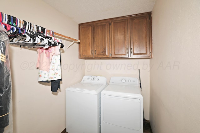 1005 Bennett Dr, Dumas, TX 79029 - laundry area featuring cabinet space and washer and dryer