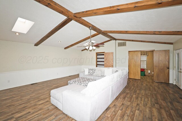 1005 Bennett Dr, Dumas, TX 79029 - living room featuring a skylight and wood finished floors