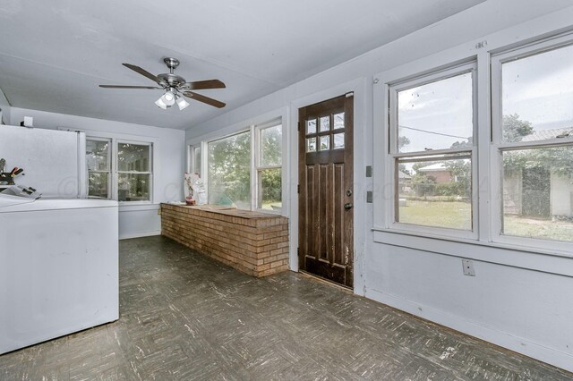 300 E 4th St, Clarendon, TX 79226 - entryway featuring ceiling fan and baseboards