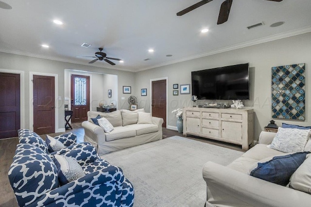 living room with ceiling fan, dark hardwood / wood-style floors, and crown molding