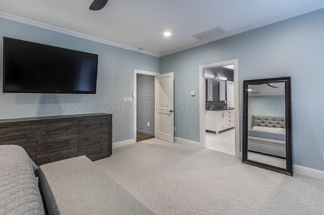 carpeted bedroom with ceiling fan and crown molding