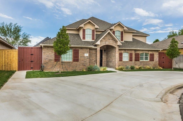 view of front of home with a storage unit