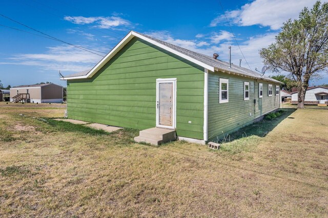 exterior space with a yard