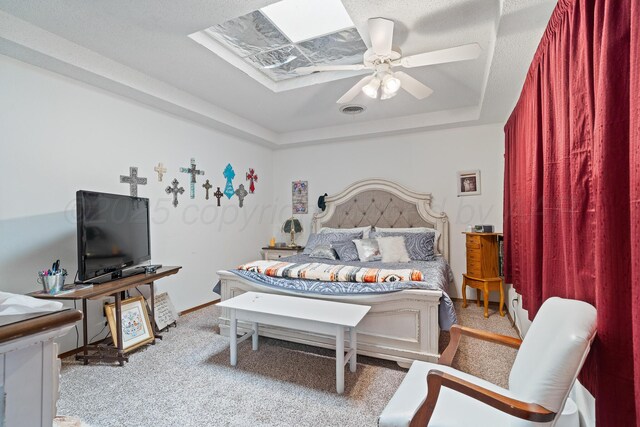 3100 Pittsburg St, Amarillo, TX 79103 - carpeted bedroom with a raised ceiling and ceiling fan