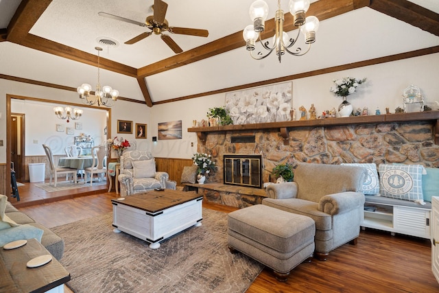 3100 Pittsburg St, Amarillo, TX 79103 - living room with a chandelier, wainscoting, wood finished floors, a ceiling fan, and a fireplace