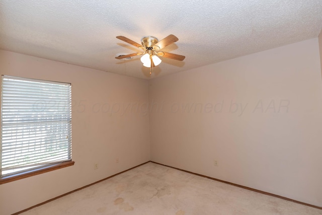 5614 Tranquil Cir, Amarillo, TX 79109 - unfurnished room featuring a ceiling fan, light carpet, and a textured ceiling