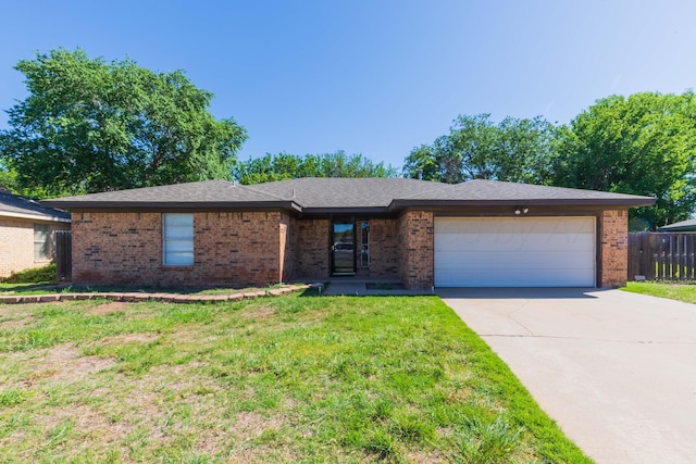5614 Tranquil Cir, Amarillo, TX 79109 - single story home featuring concrete driveway, brick siding, and an attached garage