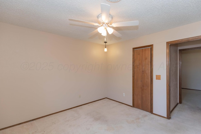 5614 Tranquil Cir, Amarillo, TX 79109 - unfurnished bedroom featuring light colored carpet, a textured ceiling, and ceiling fan