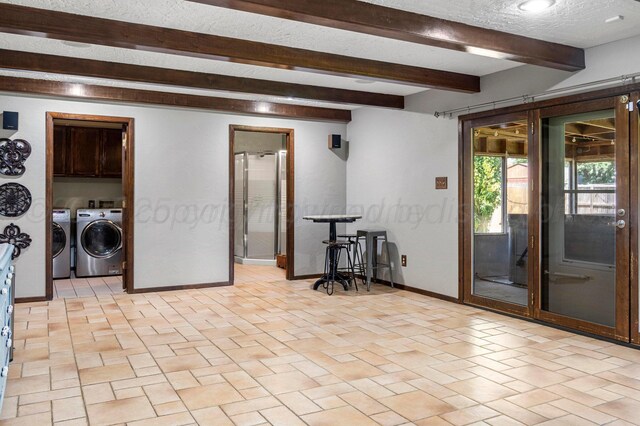 2428 N Fir St, Pampa, TX 79065 - interior space featuring washing machine and dryer, beam ceiling, and a textured ceiling