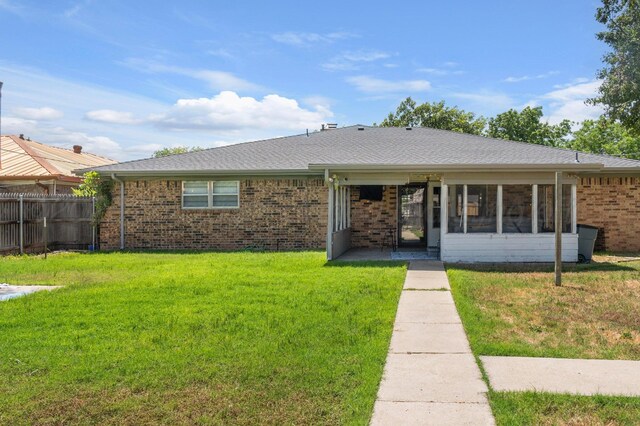 2428 N Fir St, Pampa, TX 79065 - ranch-style house featuring brick siding and a shingled roof