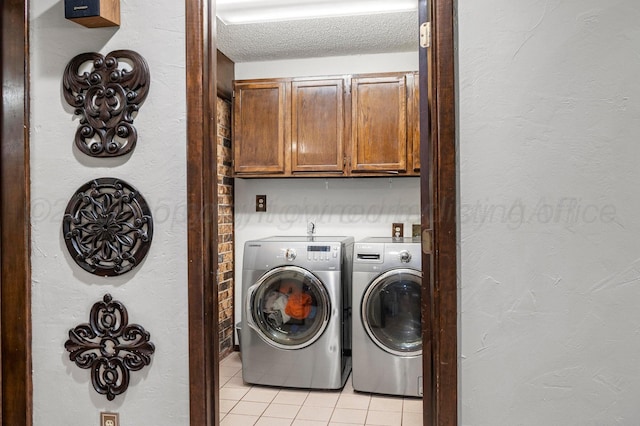 2428 N Fir St, Pampa, TX 79065 - washroom with washing machine and clothes dryer, light tile patterned floors, and cabinet space
