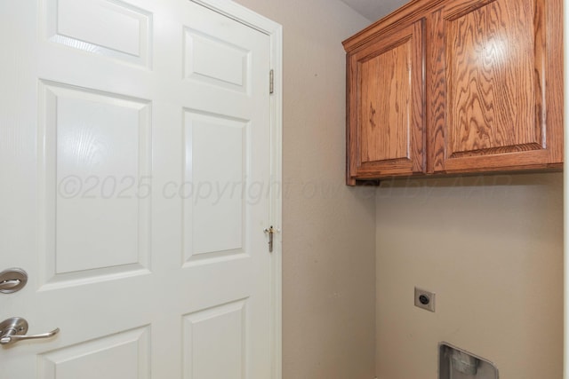 6703 Mosley St, Amarillo, TX 79119 - washroom featuring cabinet space and electric dryer hookup