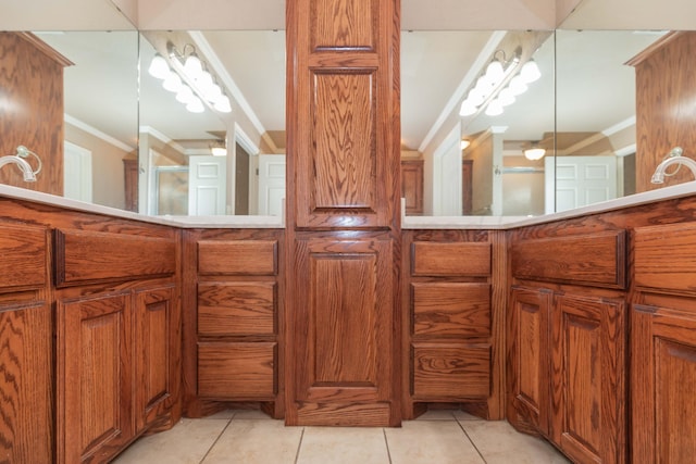 6703 Mosley St, Amarillo, TX 79119 - bathroom with tile patterned flooring and crown molding
