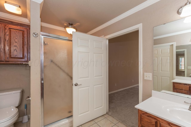 6703 Mosley St, Amarillo, TX 79119 - full bath with a stall shower, crown molding, vanity, toilet, and tile patterned flooring