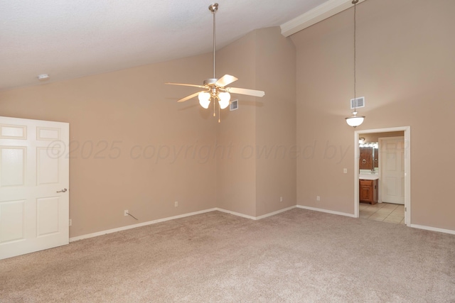 6703 Mosley St, Amarillo, TX 79119 - unfurnished room featuring light colored carpet, a ceiling fan, baseboards, and high vaulted ceiling