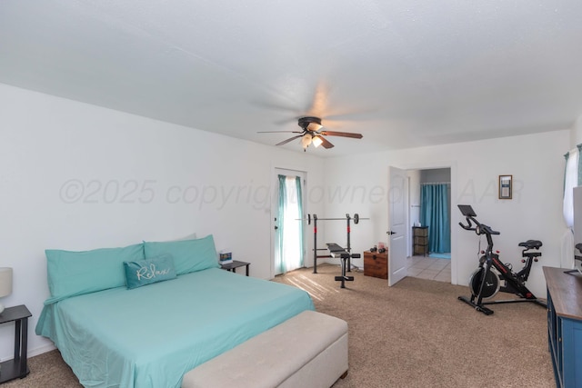 bedroom with light colored carpet and a ceiling fan