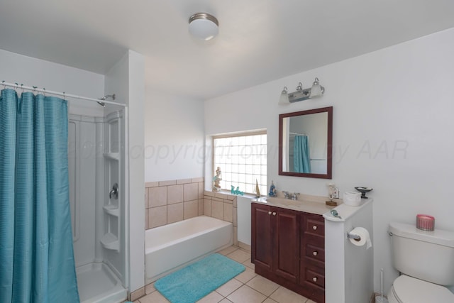 bathroom with a garden tub, a shower stall, vanity, tile patterned flooring, and toilet