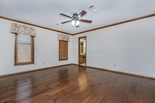 7502 Tripp Ave, Amarillo, TX 79121 - empty room with ceiling fan, dark wood-style floors, and crown molding