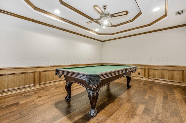 7502 Tripp Ave, Amarillo, TX 79121 - rec room with a raised ceiling, hardwood / wood-style flooring, ceiling fan, a wainscoted wall, and billiards