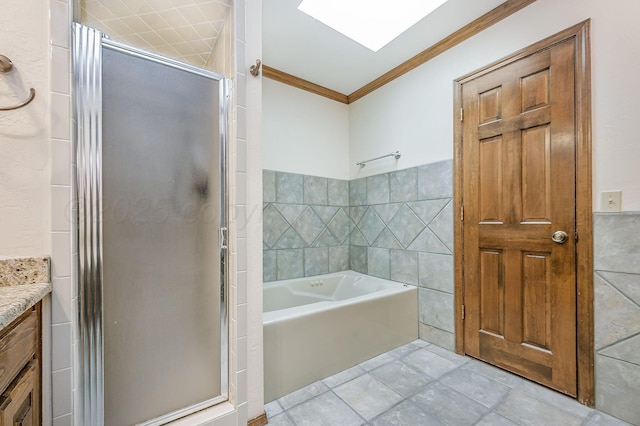 7502 Tripp Ave, Amarillo, TX 79121 - full bath with crown molding, a shower stall, a garden tub, vanity, and tile walls