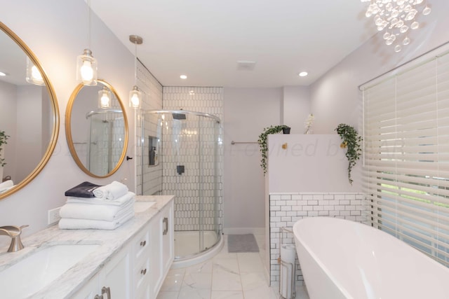 3002 S Polk St, Amarillo, TX 79109 - bathroom featuring vanity, a freestanding bath, a shower stall, marble finish flooring, and recessed lighting