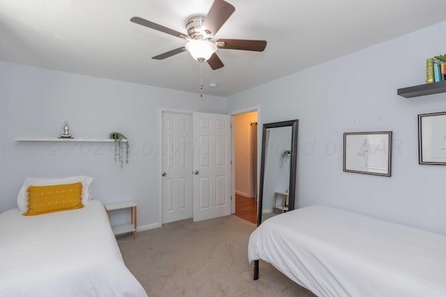 3002 S Polk St, Amarillo, TX 79109 - bedroom featuring light carpet, ceiling fan, and baseboards