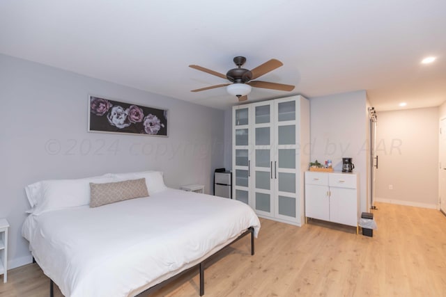 3002 S Polk St, Amarillo, TX 79109 - bedroom with light wood-style floors, recessed lighting, baseboards, and a ceiling fan