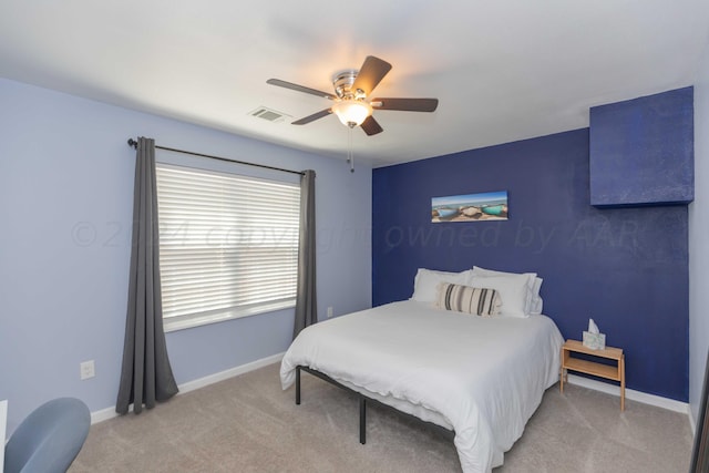 3002 S Polk St, Amarillo, TX 79109 - bedroom featuring light carpet, ceiling fan, and baseboards