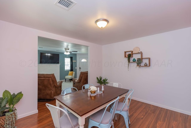 3002 S Polk St, Amarillo, TX 79109 - dining room featuring baseboards, wood finished floors, and a ceiling fan
