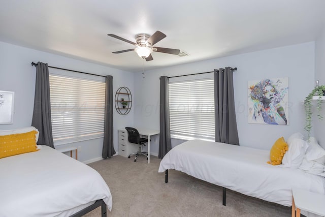 3002 S Polk St, Amarillo, TX 79109 - bedroom with light carpet, ceiling fan, and baseboards