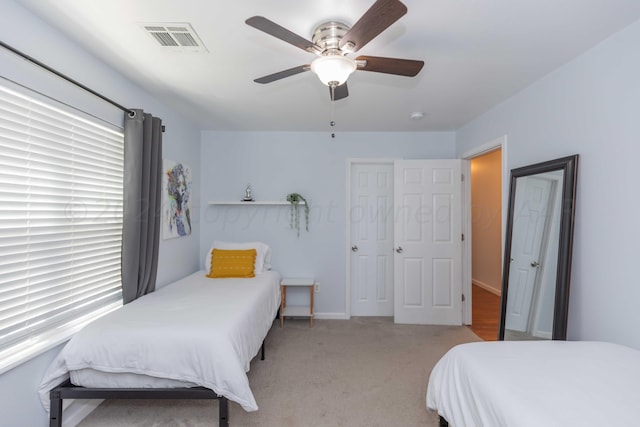 3002 S Polk St, Amarillo, TX 79109 - bedroom with light colored carpet and ceiling fan